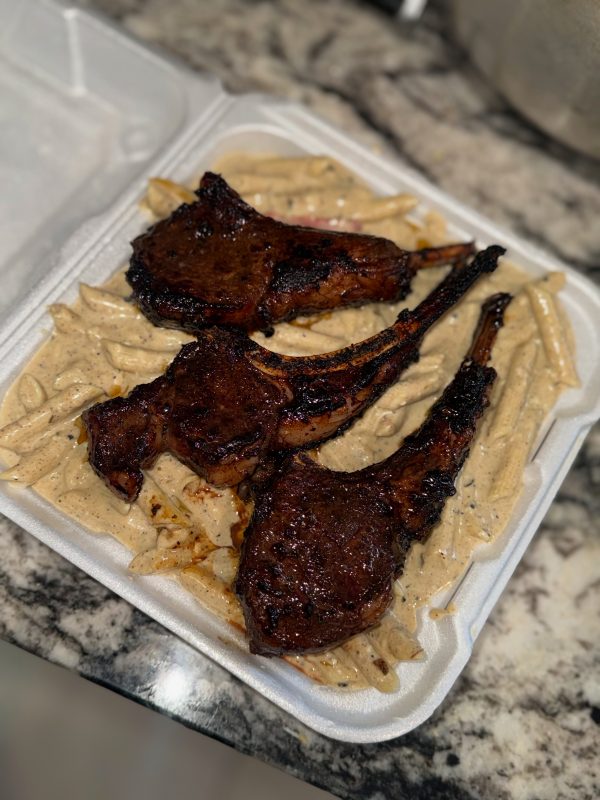 Jerk Lamb Chop Rasta pasta with garlic butter croissants