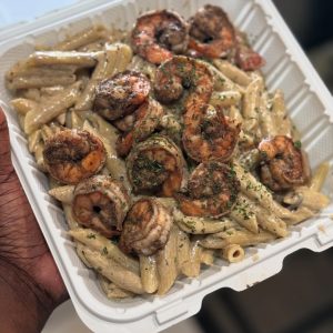 Jerk Shrimp Rasta pasta with garlic butter croissants