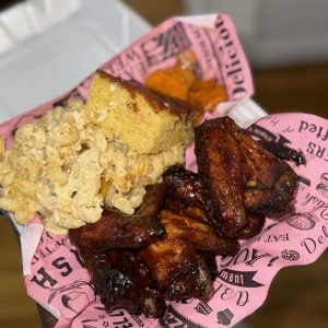 BBQ Chicken with Mac n cheese ,candied yams & honey cornbread